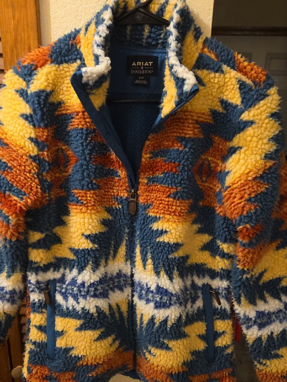 Ariat Teddy Jacket in Yellow, Blue & Orange Aztec Print